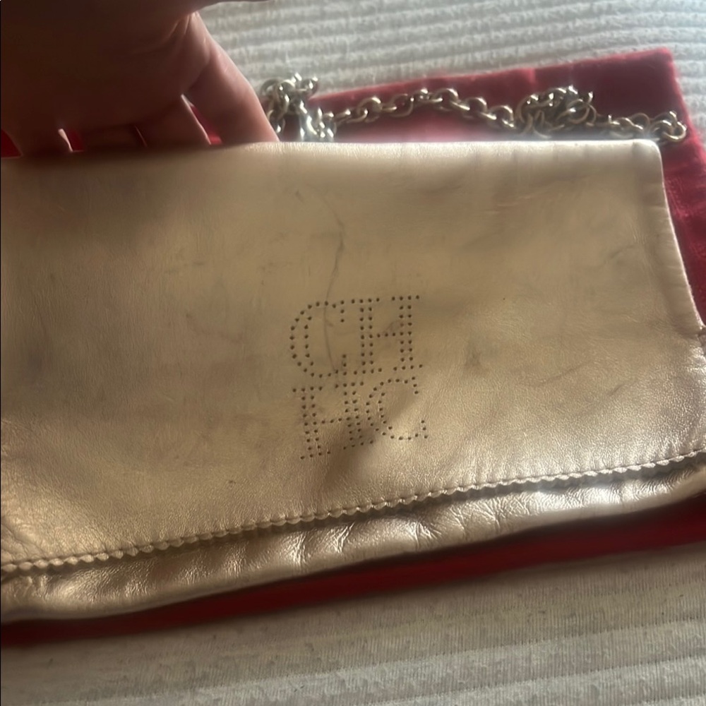 Carolina Herrera Gold Metallic Clutch with Sleek Design